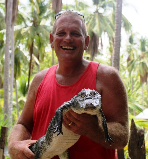 Tom with Arturo, the Baby Croc who kept trying to snuggle under Tom's armpit.