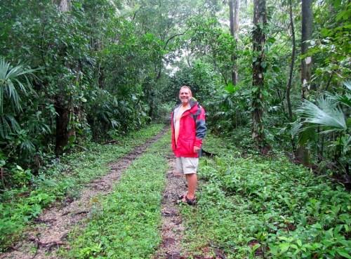 Tom leading the way in the jungle. Those tracks used to be train tracks.