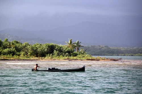 The locals paddle up the river to get fresh water every day.