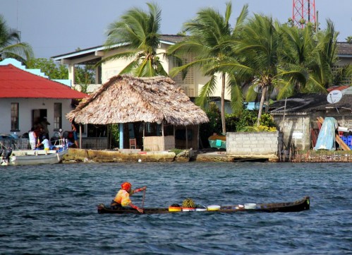 Kuna woman with her load of fresh water